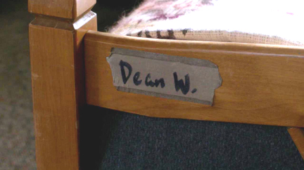Dean's name on the bed under many layers of tape.